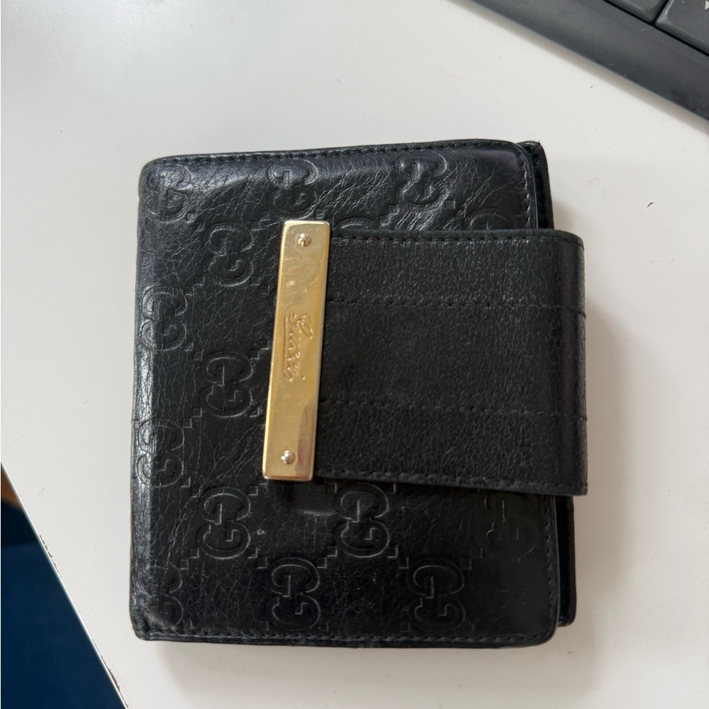 Gucci Black Embossed Leather Wallet with Gold Accent